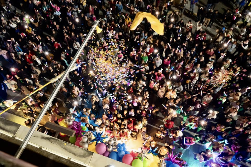 Families enjoying the Confetti Countdown in the Alley